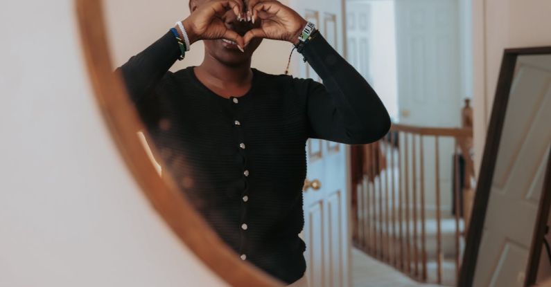 Self-Teaching - Woman Showing Heart with Hands to Mirror