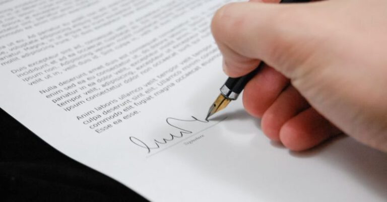 Document - Person Signing in Documentation Paper