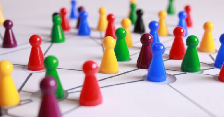 Interactive Installations - Close Up Photography of Yellow Green Red and Brown Plastic Cones on White Lined Surface