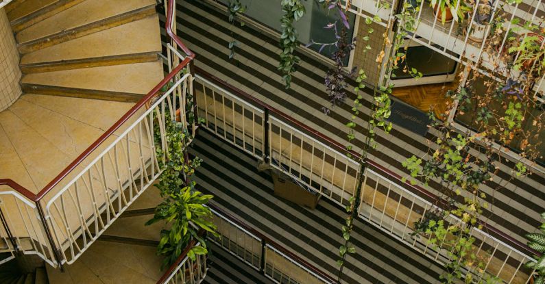 Galleries - Potted Plants Hanging from Inner Yard Balconies of a Residential Building